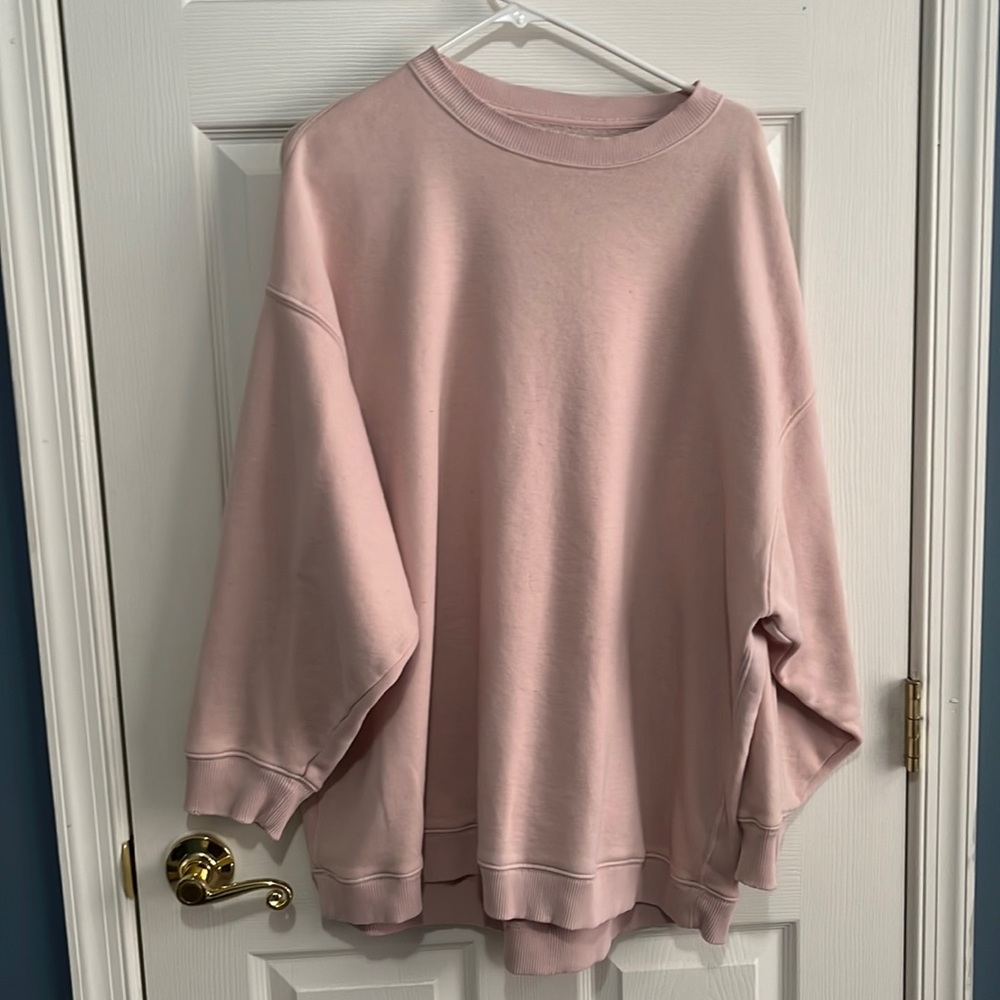 Light pink oversized lightweight sweater.